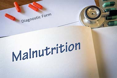 MUST-Plus: A Machine Learning Classifier That Improves Malnutrition Screening in Acute Care Facilities